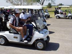 Golfers in carts 